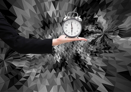 Digital composite of business woman hand holding clock against graphic dark background