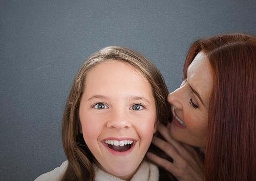 Digital composite of Mother and Daughter Smilling against a grey background