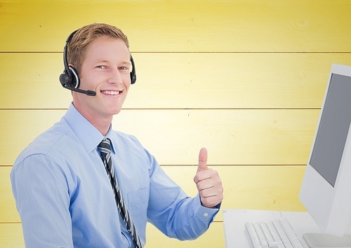 Digital composite of Happy Travel agent with headset against a yellow background