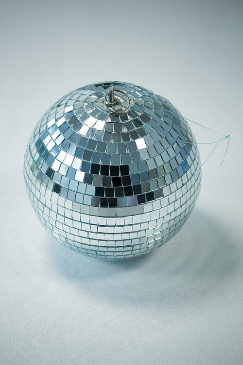 Close-up of mirror ball on white background