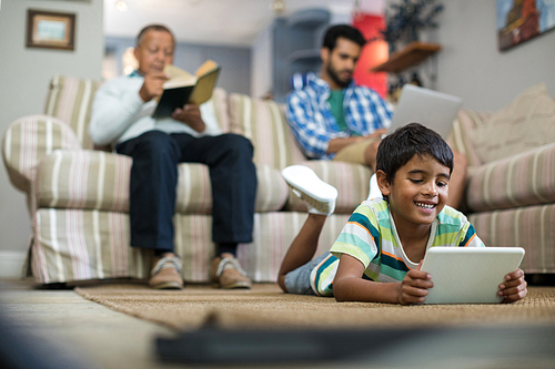 Surface level of family relaxing in living room at home