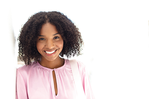 Front view of young pretty African-american employee 