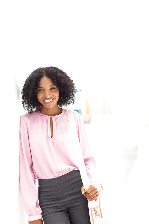 Front view of young pretty African-american employee 