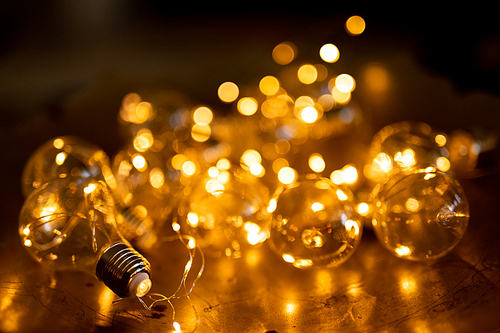 Close up of fairy lights lying on a table at home at Christmas time