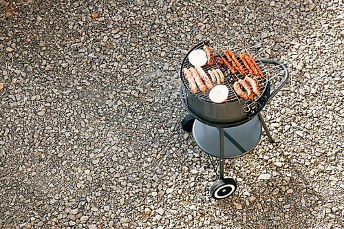 Barbecue grill with meat and sausages