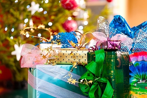 Colorful Christmas gifts under x-mas tree