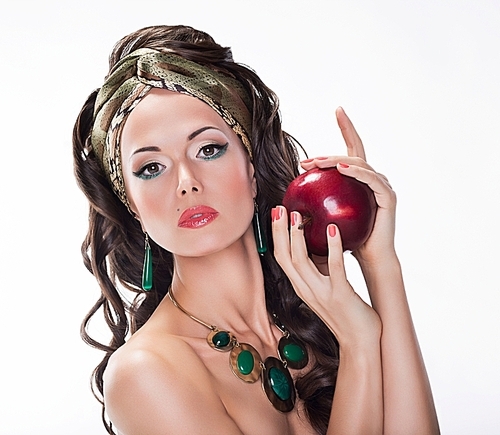 Nutrition. Beauty Woman with Red Apple on white background - Wholesome Food