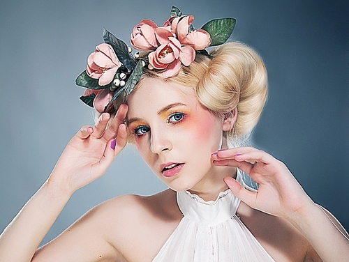 Nostalgia. Portrait of Romantic Blonde with Wreath of Flowers. Expression