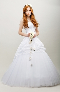 Tenderness. Redhaired Exquisite Bride in White Bridal Dress. Wedding Fashion Collection