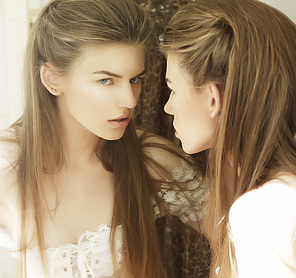 Delusion. Image of Beautiful Woman in Front of a Mirror