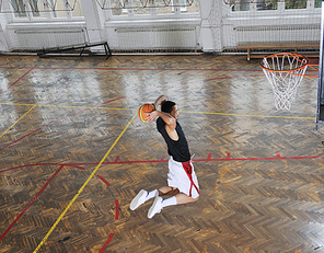 young and healthy people man have recreation and training exercise  while play basketball game at sport gym indoor hall