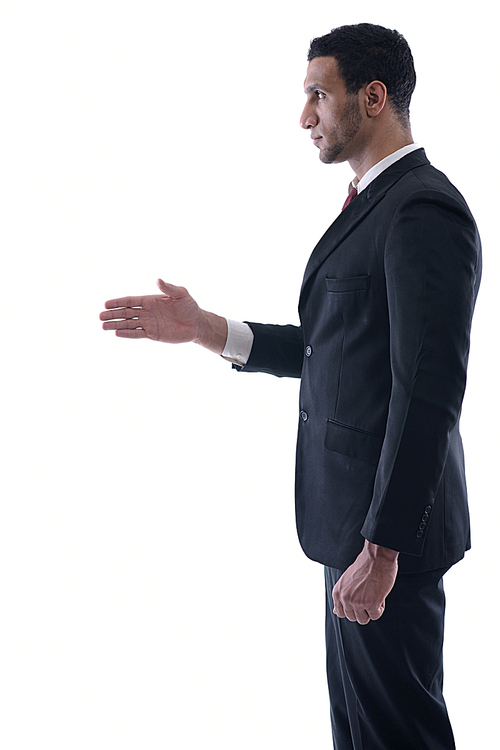 Confident business man giving you a hand shake on white background representing concept of success and cooperation
