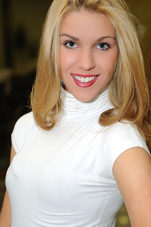 happy young woman posing indoor