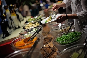 catering buffet food indoor in luxury restaurant with meat colorful fruits  and