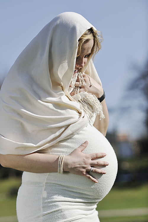 happy young pregnant womant have fun outdoor in nature at sunny day