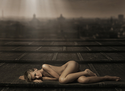 Beautiful naked woman laying