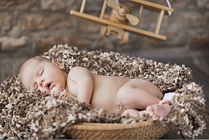 Fine picture of cute baby sleeping in toy room