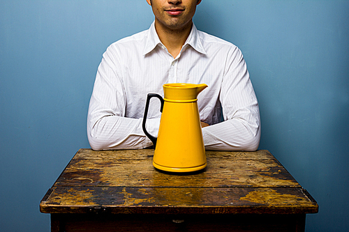 Young man with a thermos