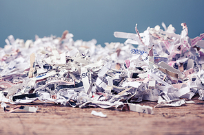 Paper cut into tiny pieces by cross shredder