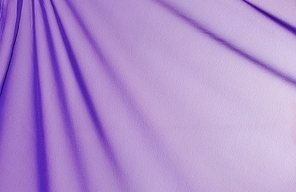 Beautiful folded violet silk background