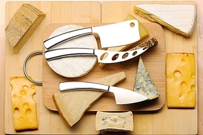 Various types of cheese on board