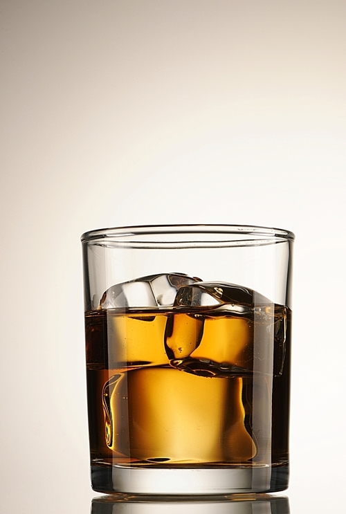 Scotch on the rocks isolated on white