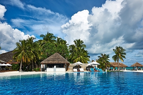 Luxury swimming pool in the tropical hotel