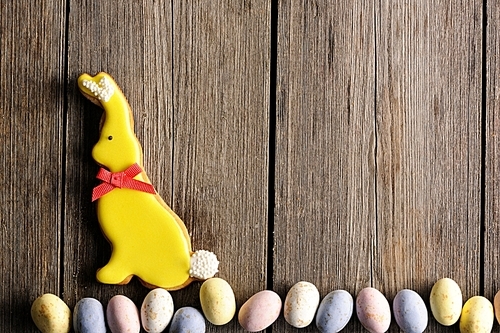 Easter homemade gingerbread cookie over wooden table