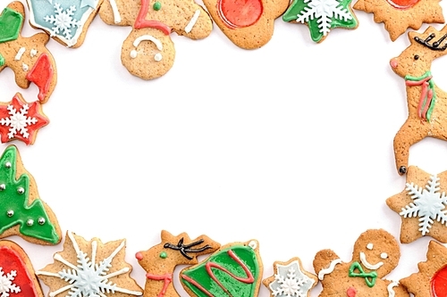 Christmas gingerbread cookies over white
