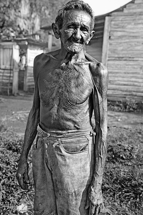 black and white portrait of poor farmer of tobacco plantation|cuba