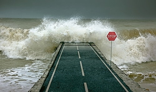 Huge waves|covering highway