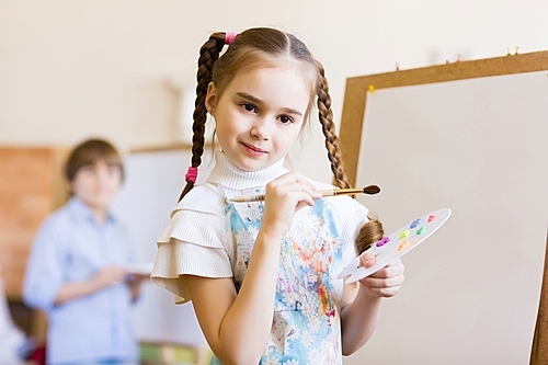 Cute girl painting