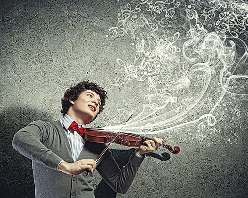 Young man violinist