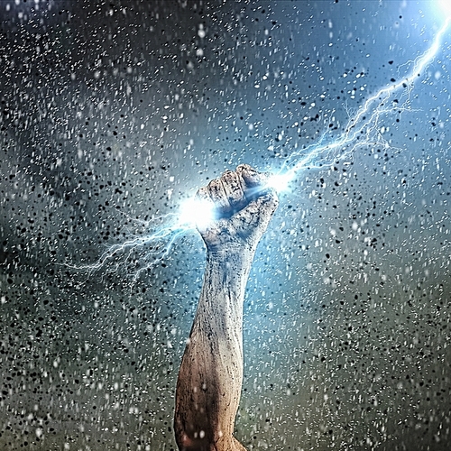 Human hand holding lightning