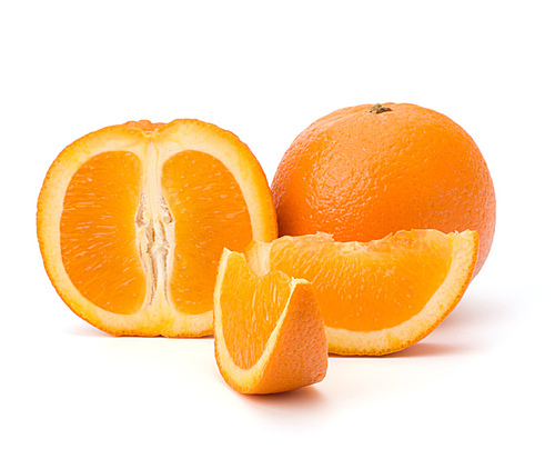 Sliced orange fruit segments  isolated on white