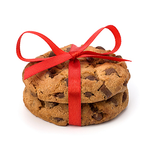 Festive wrapped chocolate pastry cookies isolated on white