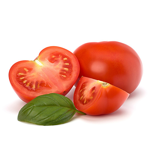 Tomato and basil leaf isolated on white