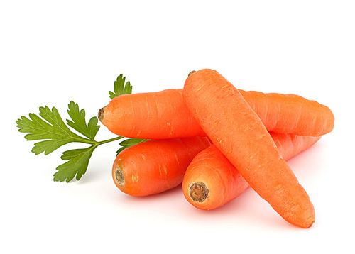 Carrot tubers isolated on white