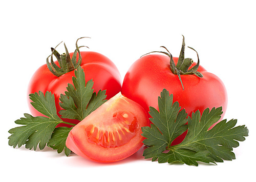 Tomato vegetables and parsley leaves still life isolated on white cutout