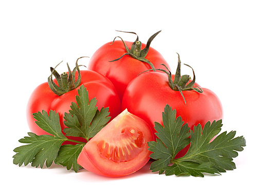 Tomato vegetables and parsley leaves still life isolated on white cutout