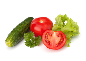 tomato|cucumber vegetable and lettuce salad isolated on white