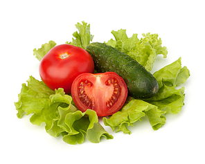tomato|cucumber vegetable and lettuce salad isolated on white