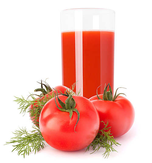 Tomato vegetable juice in glass isolated on white cutout