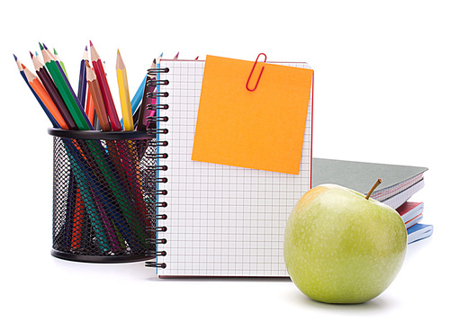 blank notebook sheet and apple. Schoolchild and student studies accessories. Back to school concept.