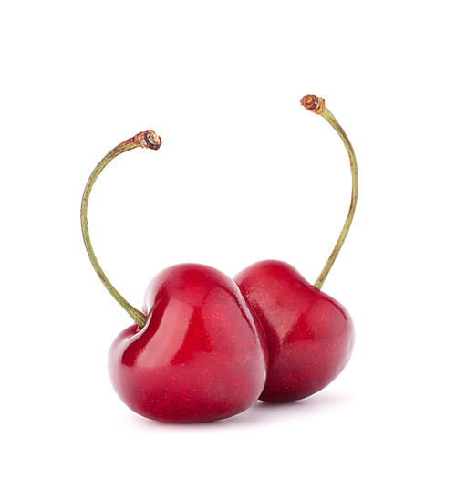 Two heart shaped cherry berries isolated on white cutout