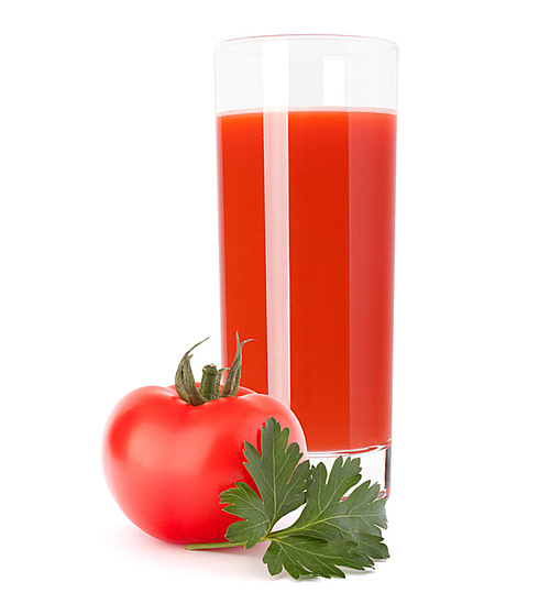 Tomato vegetable juice in glass isolated on white cutout