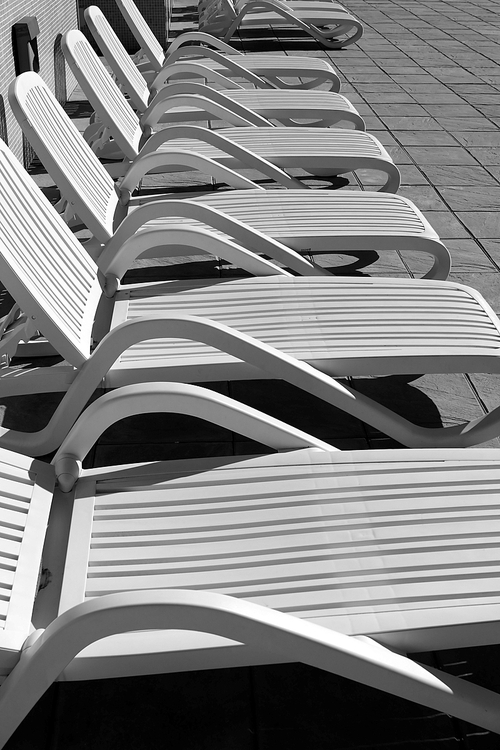 white resin solarium hammocks row black and white