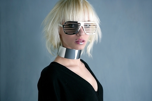 blonde fashion futuristic silver glasses girl  gray background