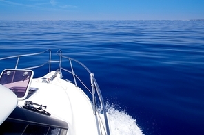 Boat bow open porthole sailing in blue calm sea during summer vacations