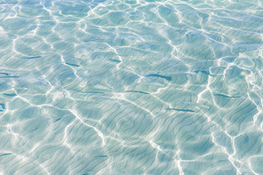 Tropical sea water texture reflections like paradise summer vacation